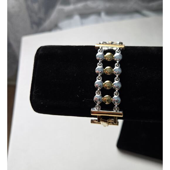 Gold and Silver Toned Clasp Bracelet - Picture 2 of 11